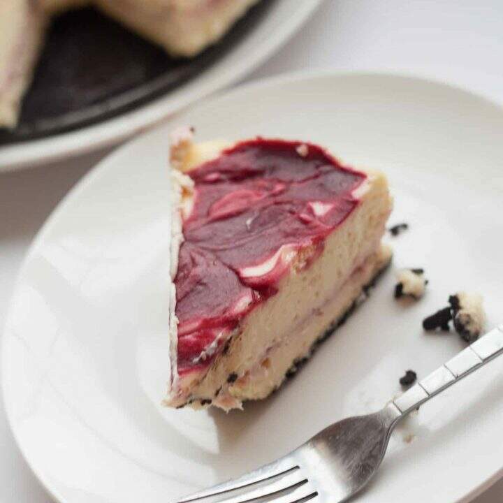 White Chocolate Raspberry Cheesecake with Oreo Crust from Call Me Betty {callmebetty.com}