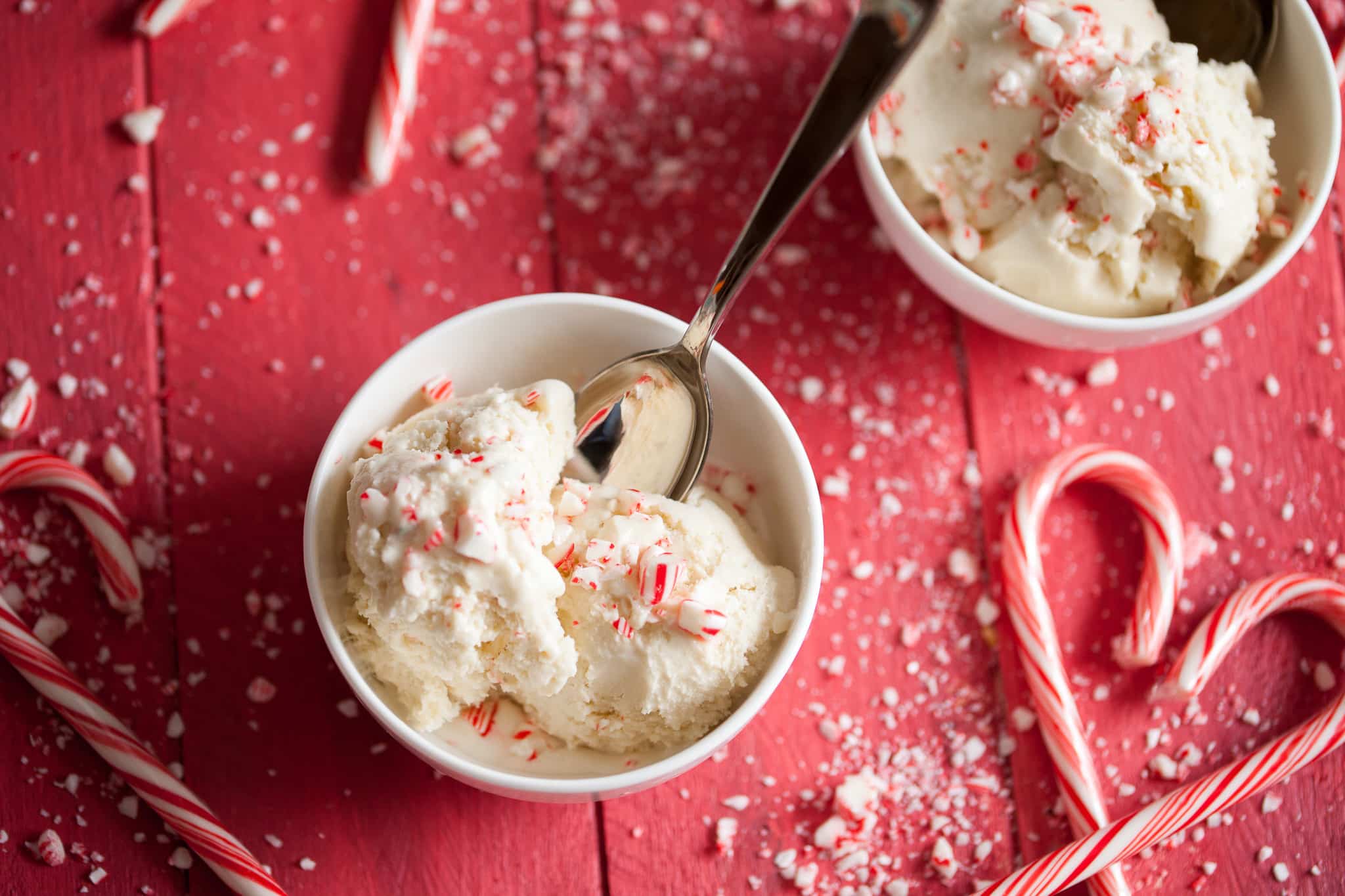 This homemade peppermint candy cane ice cream is the most wonderful holiday treat, it's especially delicious when enjoyed with brownies!