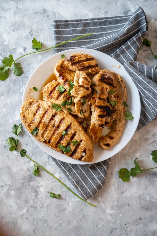 meal prep grilled Chicken on a white plate 