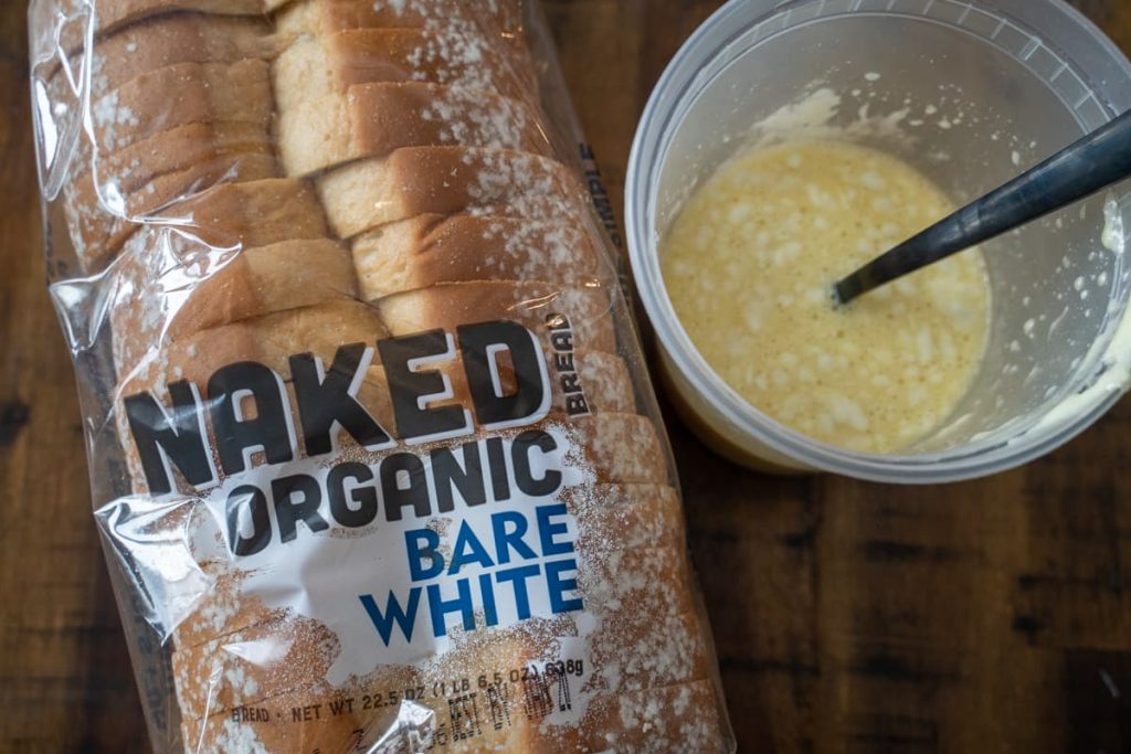 N aked white bread next to french toast mixture